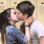 Teens kissing
